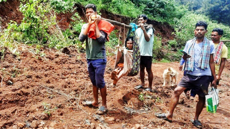 Carrying elders on their shoulders as no transportation and all roads were wiped out